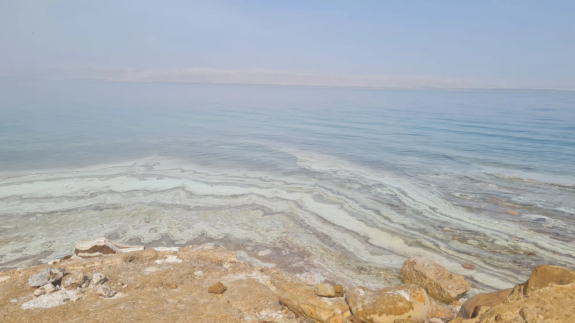 White salt crusts on the shore of the Dead Sea