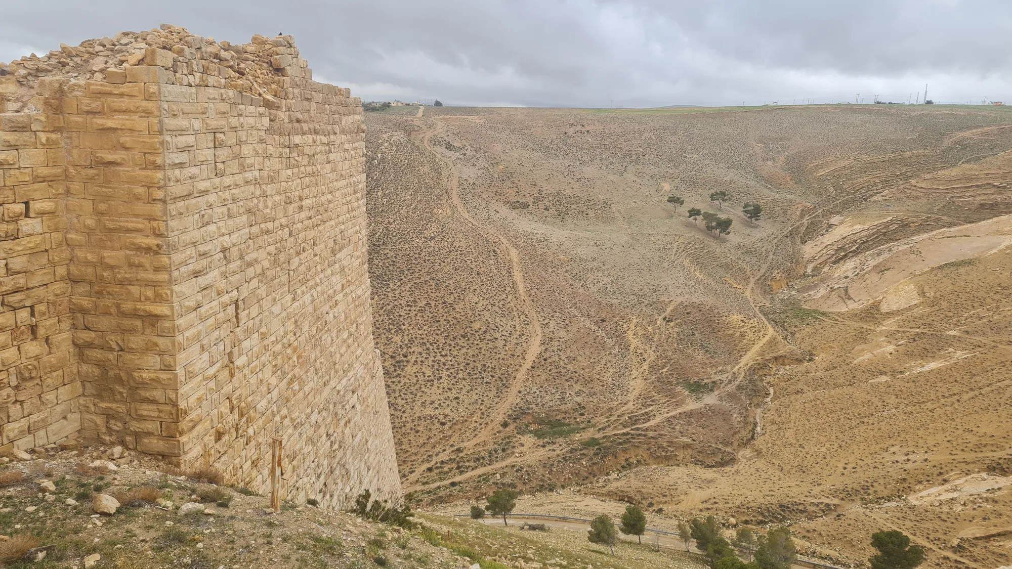 Wall of Shobak castle above a valley