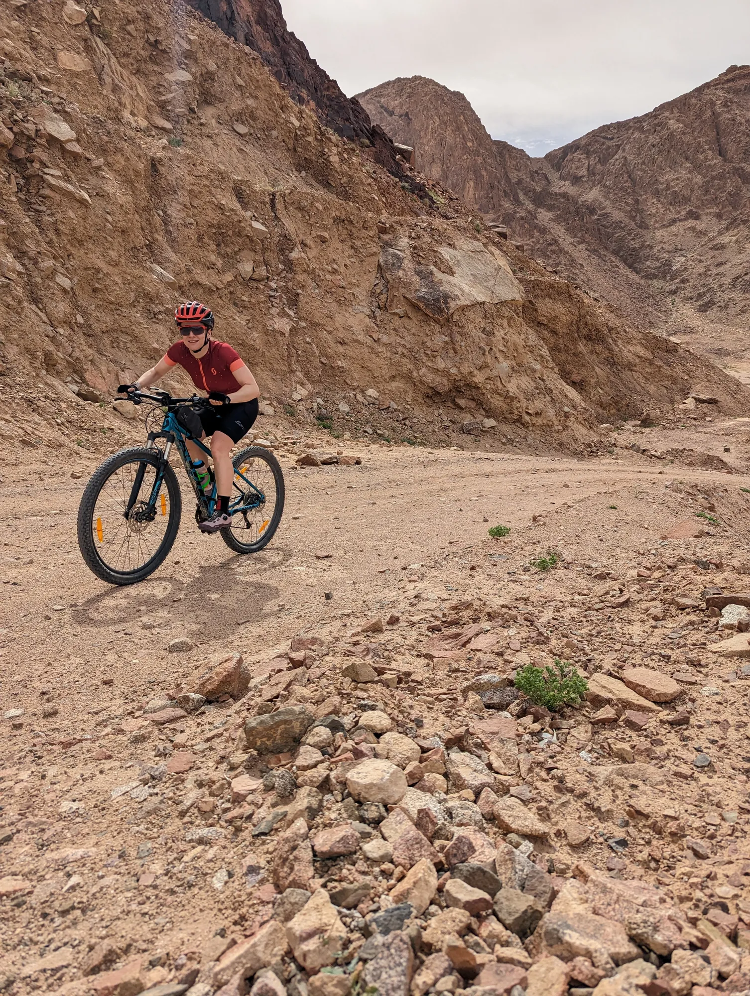 Descent over stony ground between rocks