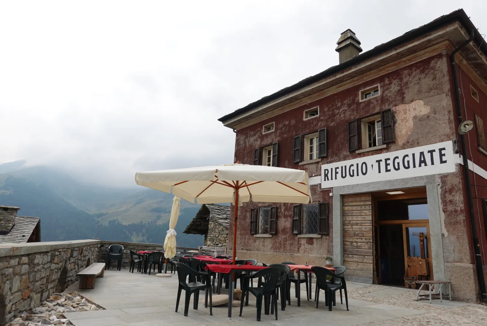 Rifugio Teggiate with its terrace and parasols
