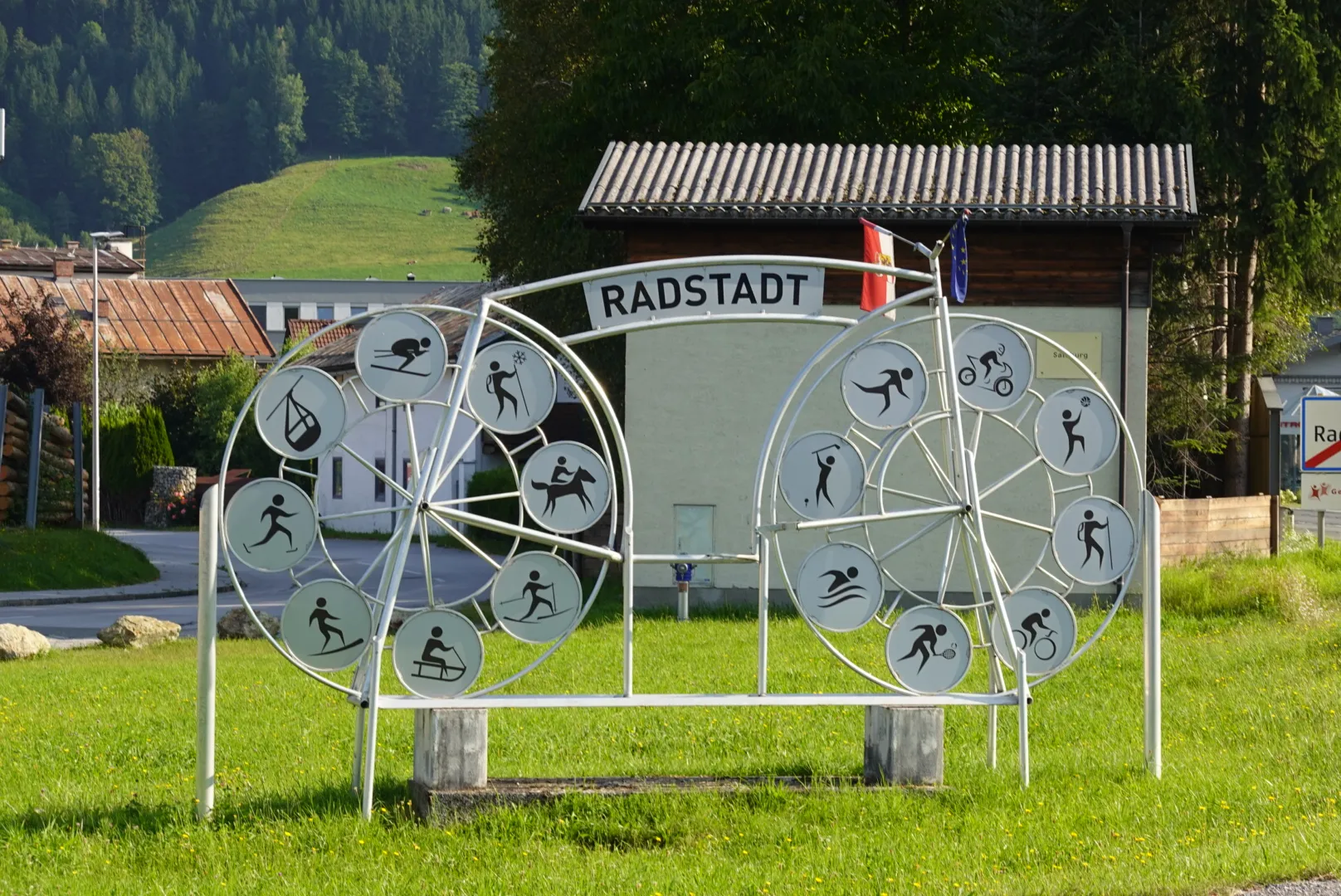 Town-sign wheel with sports pictograms in Radstadt