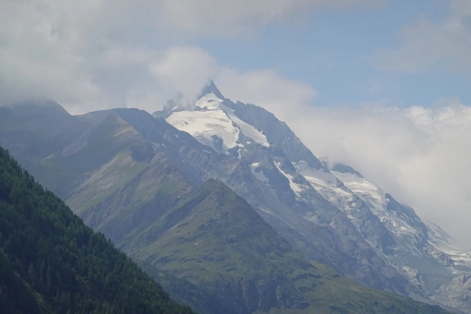 The Großglockner with snow and glacier, half in cloud