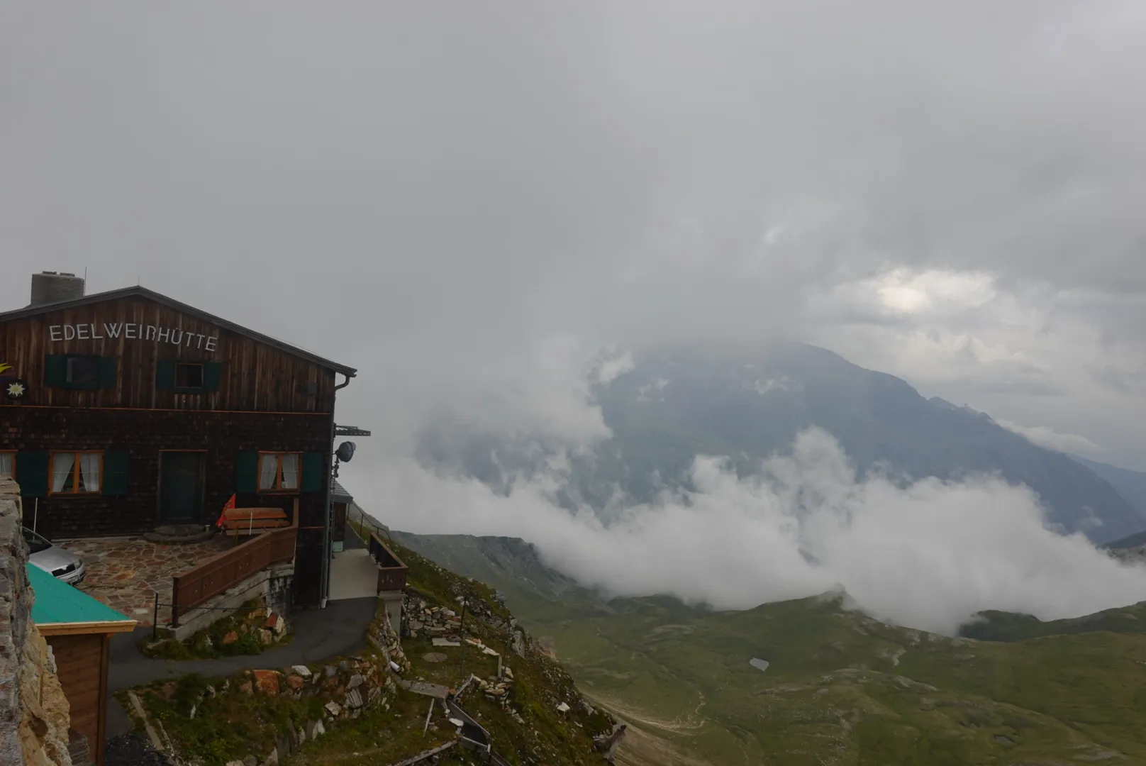 The Edelweißhütte on the rock above a sea of clouds