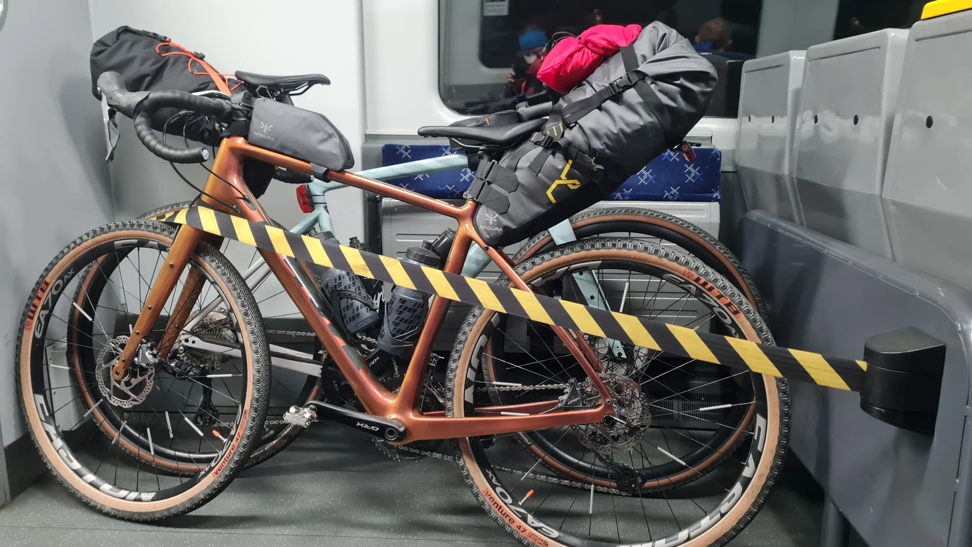 Two loaded gravel bikes in the bike section of a regional train