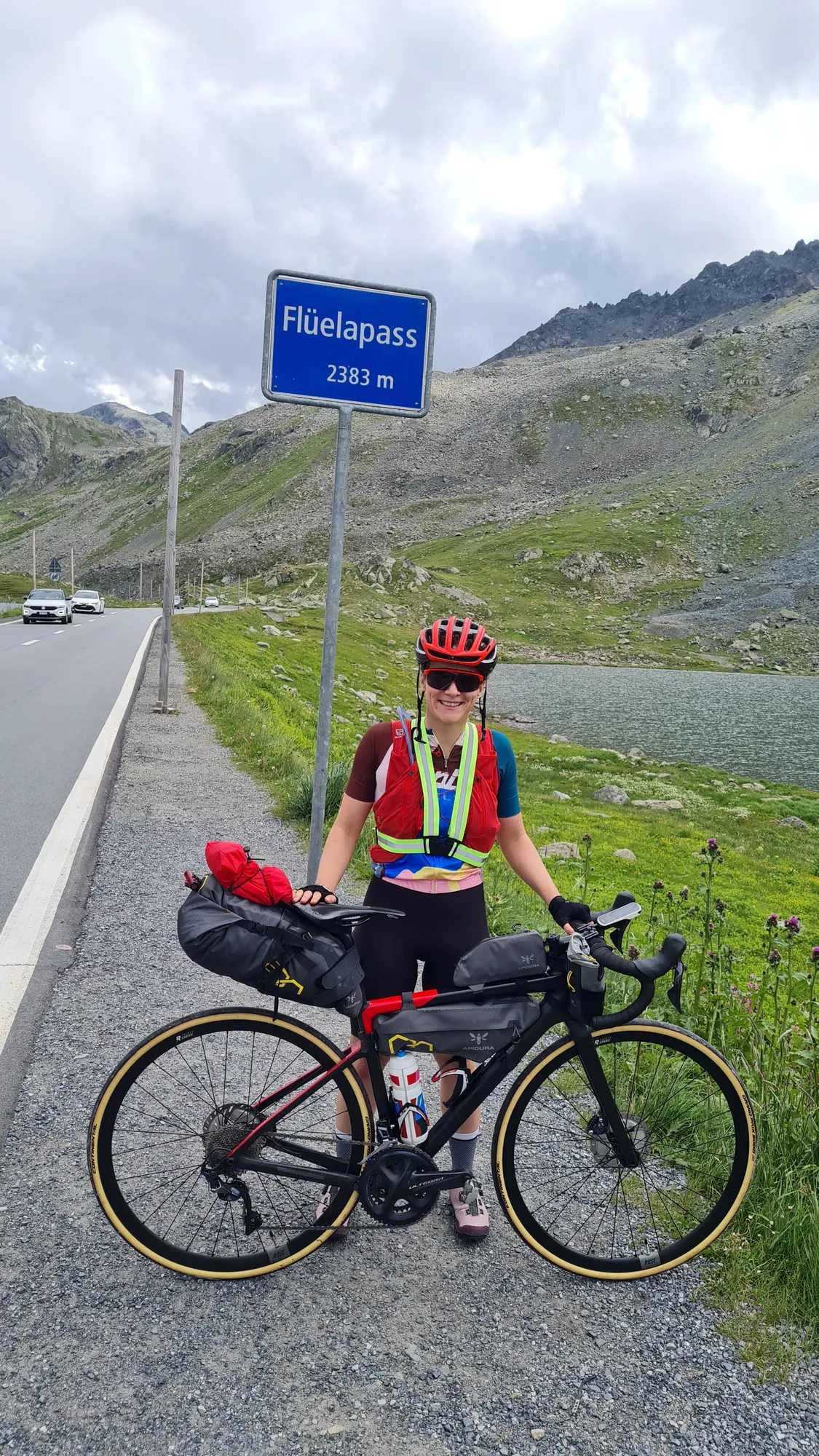 With the bike at the Flüelapass sign, 2383 m