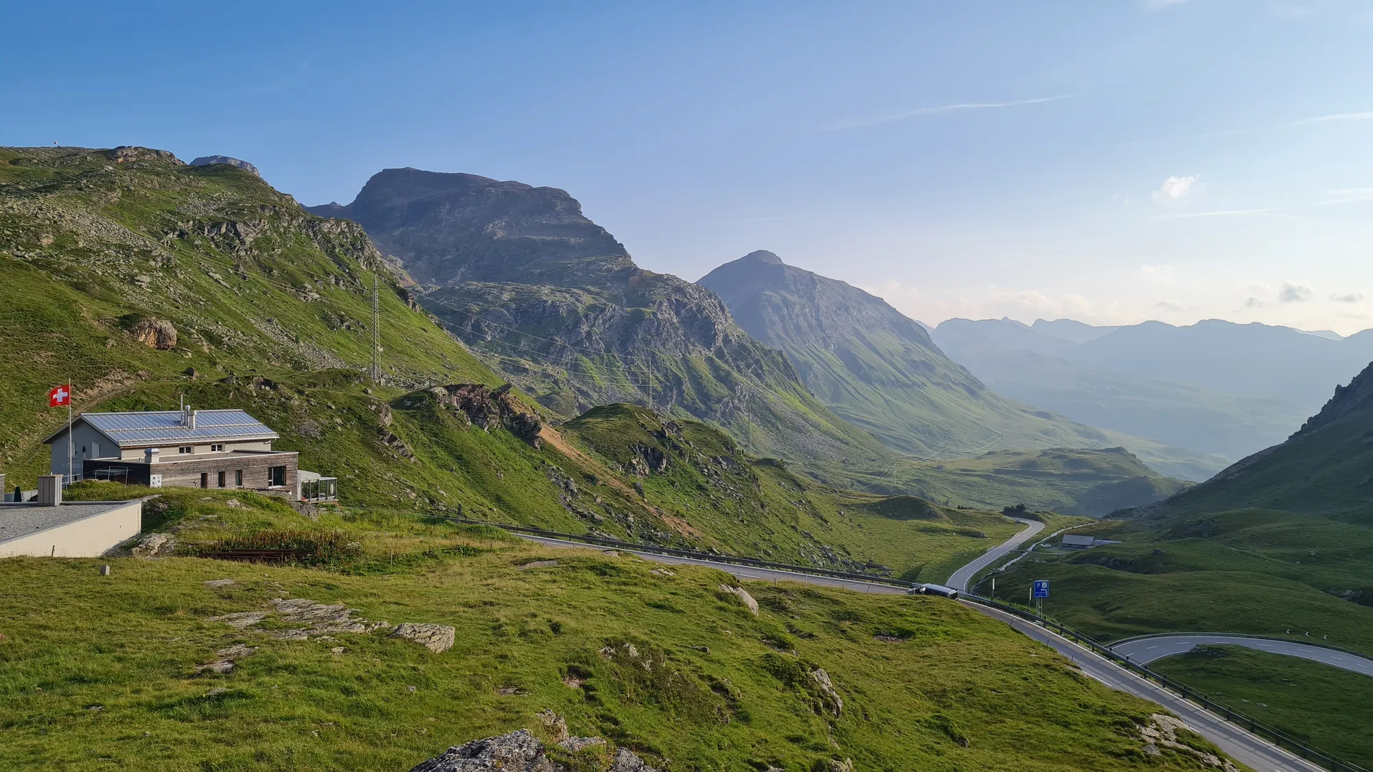 Evening light over the Julier Hospiz and the pass road