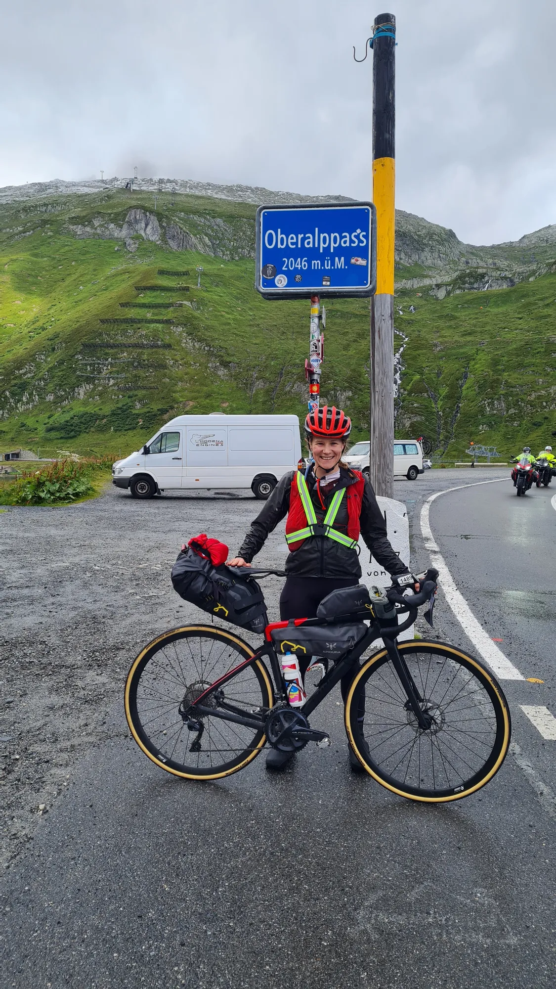 In the rain at the Oberalppass sign